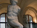 Paris Louvre Sculpture 1513-15 Michelangelo The Rebellious Slave with The Dying Slave behind
